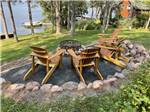 Wooden chairs around a fire pit at GATHERING PLACE RESORT & LODGE - thumbnail