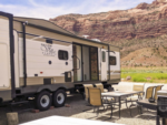 Trailer and table at Redrock Tiny Home Resort - thumbnail