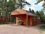 Exterior of a log rental cabin at PINE HAVEN VENUE & LODGING - thumbnail