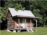 A rustic rental cabin at HEAVENLY HILLS NATURE RETREAT - thumbnail