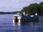 Boat on a lake at site Leisure Landing RV Park - thumbnail