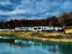 RVs by the water at Little Sinkin Creek RV Resort & UTV Campground - thumbnail