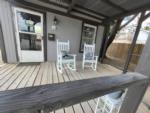Patio with rocking chairs at Franklin Oasis RV Park - thumbnail