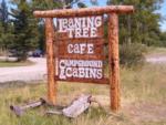 Rustic park sign at Leaning Tree Cafe and Campground - thumbnail