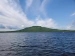 Lake with mountain in the background at Jackman Landing Campground & Cabins - thumbnail