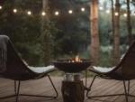 Fire pit with wood views at Red River Valley RV Park - thumbnail