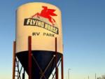 The water tower with the park name on it at FLYING HORSE RV PARK - thumbnail
