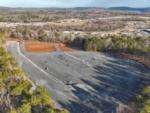 Aerial view of the campground and the empty sites at DEW DROP IN - thumbnail