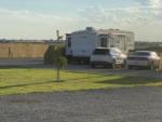 RV and cars in a gravel site at Scenic Valley RV Park - thumbnail