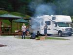 People visiting outside their RV - thumbnail