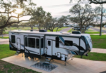 5th wheel in a paved site at Horseshoe Ridge RV Resort - thumbnail