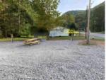 A gravel RV site with picnic table - thumbnail