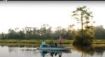Family fishing in boat at Leisure Lakes RV Resort - thumbnail