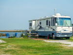 RV site by the water Cedar Island Ranch - thumbnail