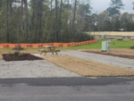 Gravel site with picnic table at Oceans RV Resort - thumbnail