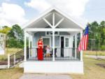 Mother and son on the porch of a rental at OCEANS RV RESORT - thumbnail