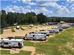 A row of trailers parked in gravel sites at THORNHILL RIDGE RV COMMUNITY - thumbnail
