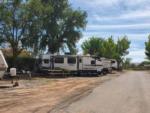 The gravel road next to the back in sites at RV PARK AT NAVAJOLAND HOTEL - thumbnail
