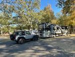 RV towing a jeep at Ohana Celebration Park - thumbnail