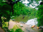 Ziplining over the water at eXplore Brown County - thumbnail