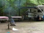 RV with picnic tables and fire pit - thumbnail