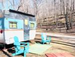 Vintage trailer with colorful chairs - thumbnail