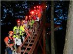 A group of people with lighted hardhats - thumbnail
