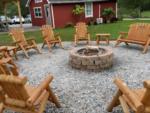Fire pit with seating area at site Cedar Lake Family Campground - thumbnail