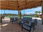 Covered outdoor seating area at Southern Sands RV Resort - thumbnail