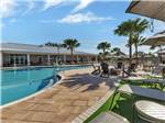 Poolside chairs at Southern Sands RV Resort - thumbnail