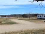 A view of an empty gravel site at BRIDGEVIEW RV PARK - thumbnail