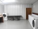 Inside view of the laundry room at BRIDGEVIEW RV PARK - thumbnail