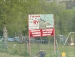Welcome sign at site Over the Hill RV Park - thumbnail