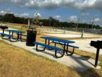 A view of the paved sites and picnic benches at NEW CANEY RV PARK - thumbnail