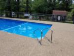 The fenced in swimming pool at PEACEFUL PINES FAMILY CAMPGROUND - thumbnail