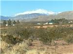 View of snowcapped mountains at Mountain Meadows RV Park - thumbnail