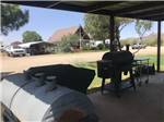 Covered area with BBQs at Mountain Meadows RV Park - thumbnail