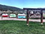 Three vintage trailers and the park sign at Lava Campground - thumbnail