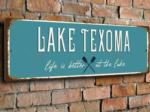 Park sign on a brick wall at Texoma RV Oasis - thumbnail