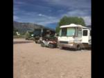 Parked RV's at site Pine Creek Cabins Resort - thumbnail