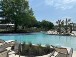 Large pool and seating area at GULFPORT LUXURY RV RESORT - thumbnail