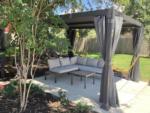 Covered seating area at GULFPORT LUXURY RV RESORT - thumbnail