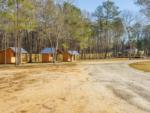 The gravel road going by our cabins for rent at SANWAR RV PARK & RESORT - thumbnail