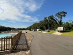 Paved road and pool area at Blue Heron Escape RV Resort - thumbnail