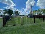 Gated grass area at site Angleton RV Park & Resort - thumbnail