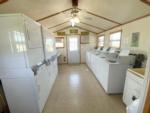 Interior of the laundry facility at SILVER WIND RV PARK AND CABINS - thumbnail