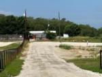 Entrance road into the park at C&W RV PARK - thumbnail