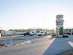 Travel trailers parked by the park sign at TIMBER RIDGE RV PARK - thumbnail