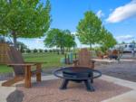 Adirondack chairs around a fire pit at STARDUST AIRSTREAM RV RESORT AT CEDAR BREAK LODGING - thumbnail