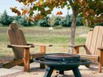 Seating at a fire pit at STARDUST AIRSTREAM RV RESORT AT CEDAR BREAK LODGING - thumbnail